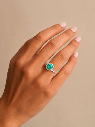 Crossed Halo Round Emerald Ring
